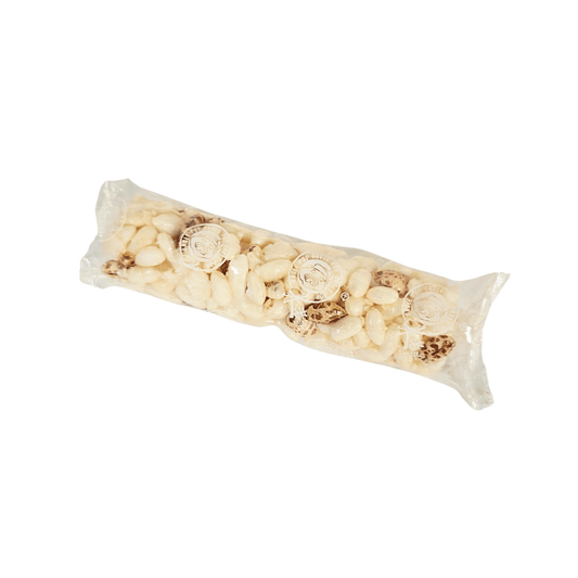 A transparent package of Barley Rice Stick with visible brown barley and white rice pieces.