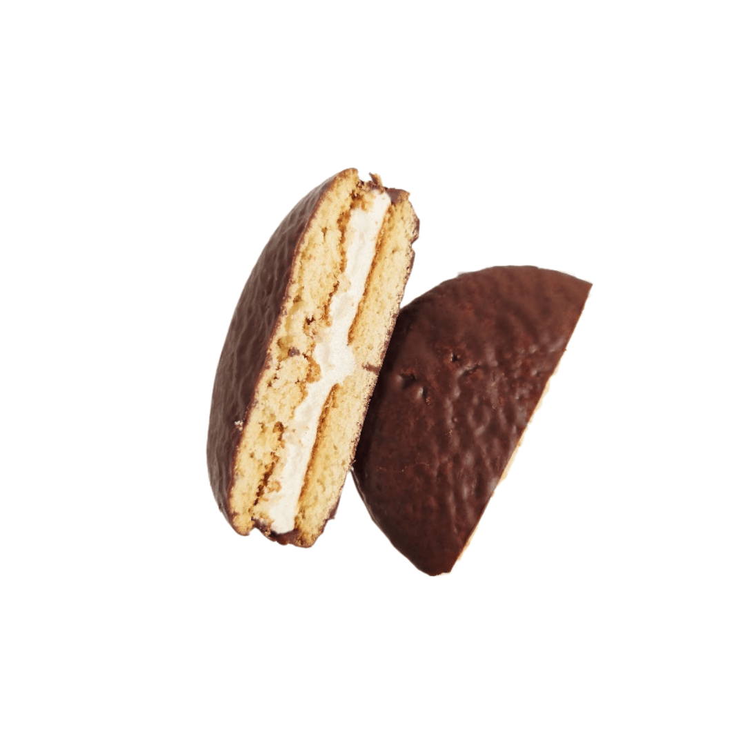 The inside of a Choco Pie with marshmallow filled in the middle surrounded by cake covered in chocolate.