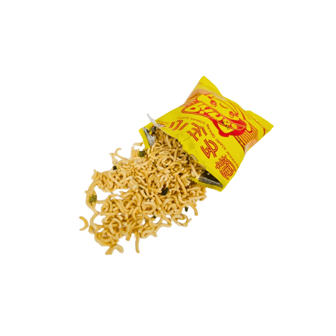 Open pack of instant noodles with noodles spilling out on a white background