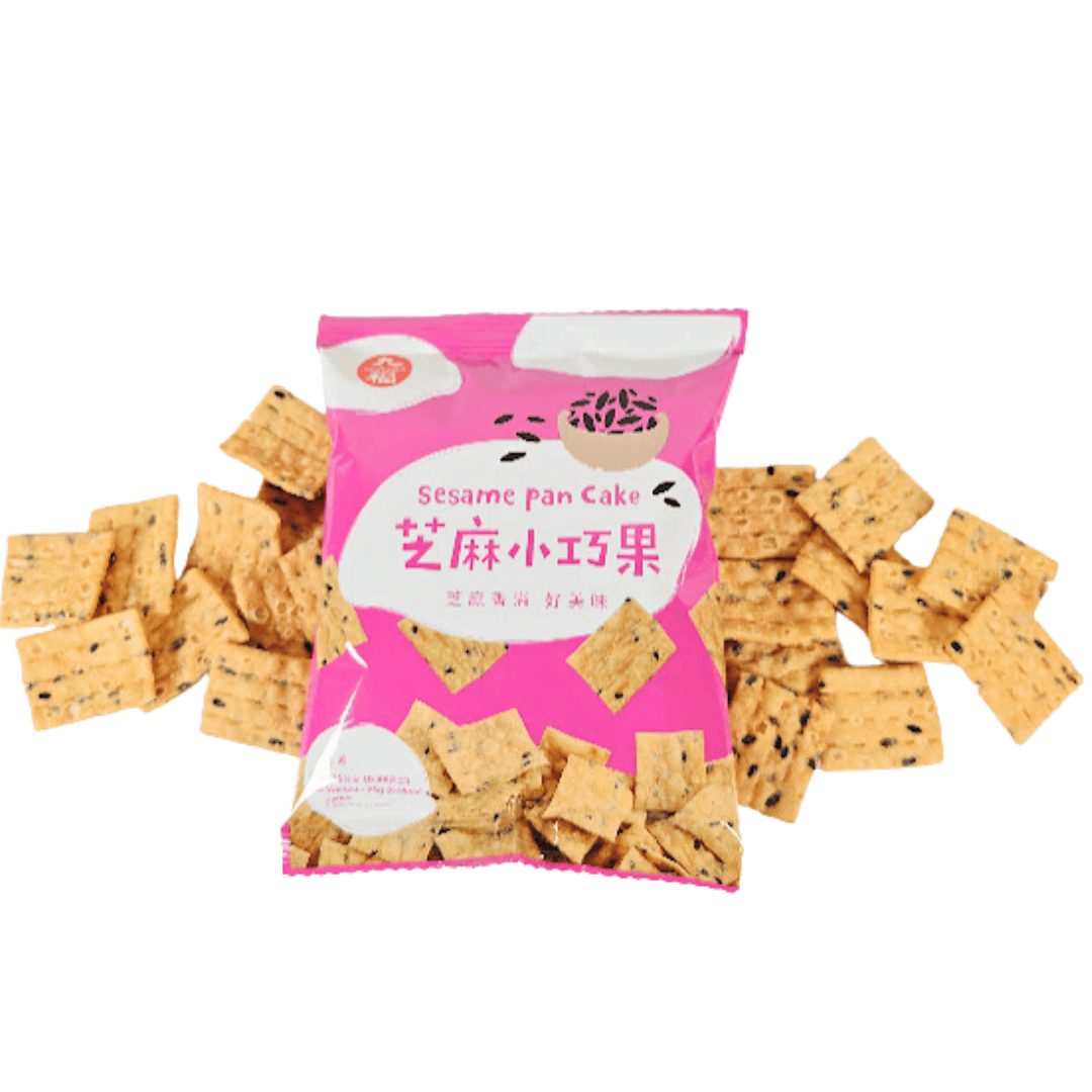 Pink Sesame pan cake package with sesame crackers spread throughout behind the package