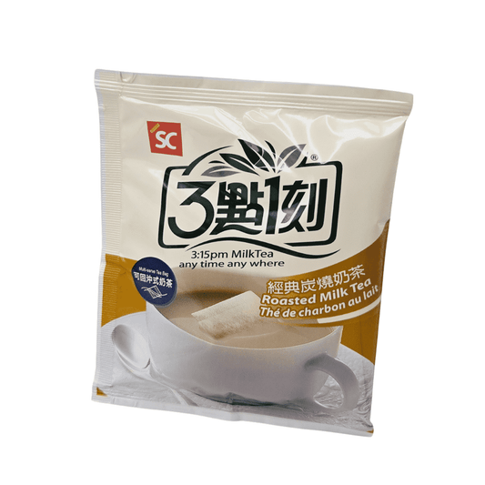 A packet of 3:15pm Milk Tea with 'Roasted Milk Tea' written in English, Chinese, and French. The packaging features a cup of milk tea with a tea bag inside and the tagline 'any time any where' printed below the product name.