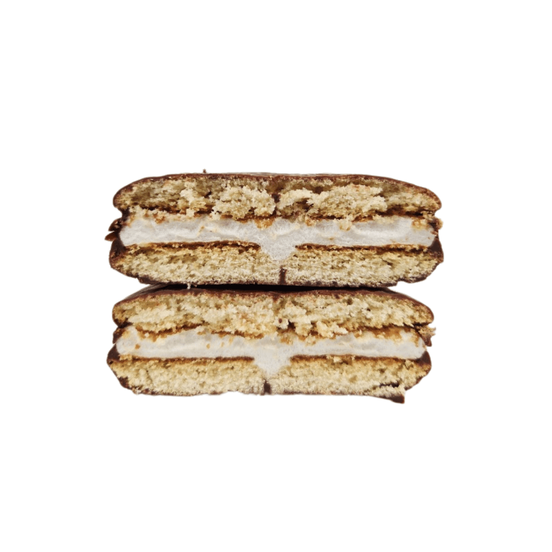 The inside of a Choco Pie with marshmallow filled in the middle surrounded by cake covered in chocolate.