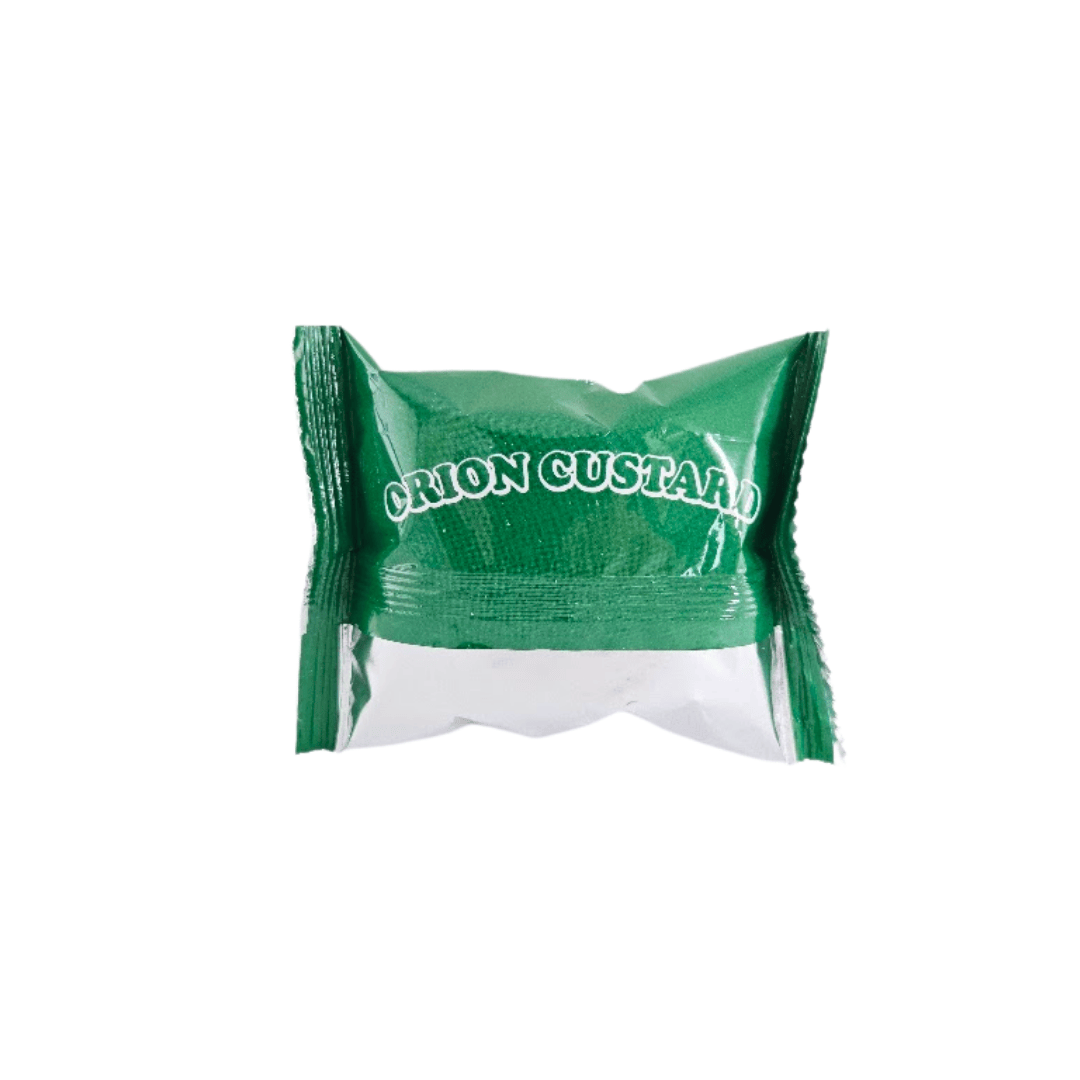 Green and white snack packet with 'Cajon Custard' branding on a white background