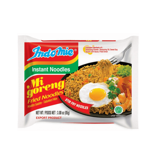 Package of Indomie Migoreng fried noodles with a photo of cooked noodles topped with an egg, shrimp, lettuce, and tomatoes. 