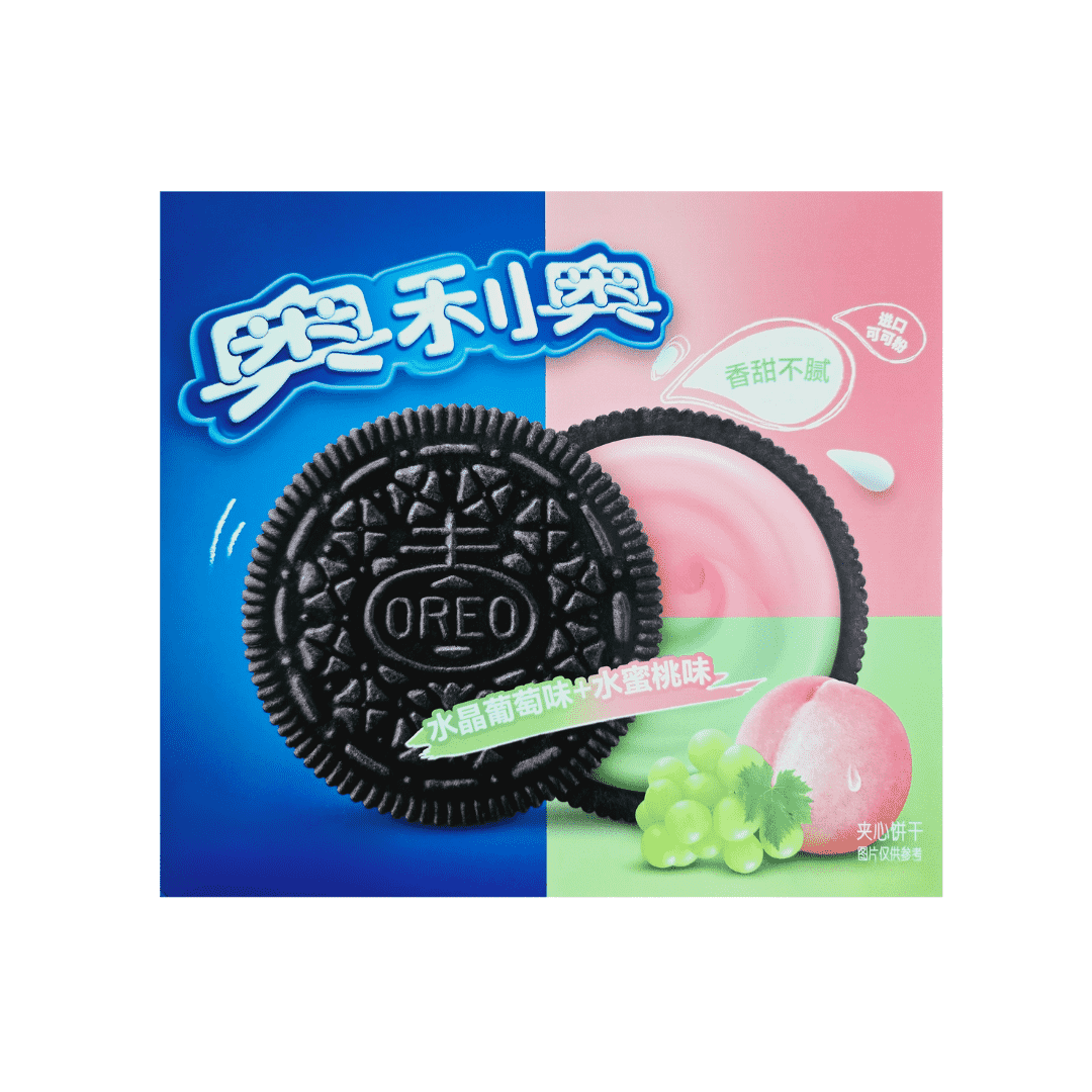 Oreo with half peach flavor cream and half green grape flavor cream with a blue, pink, and green background.